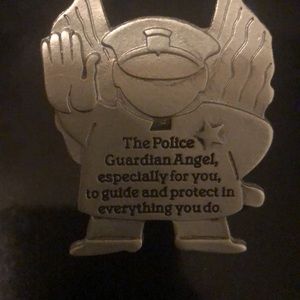 Policeman guardian angel visor clip